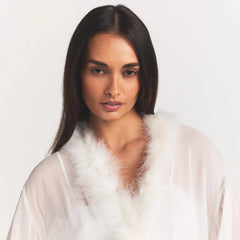 BRIDAL SLEEP FEATHER TRIM LONG ROBE | IVORY ON A MODEL SIDE VIEW @ | FOCUS: 0.0, 1.0, 0.9