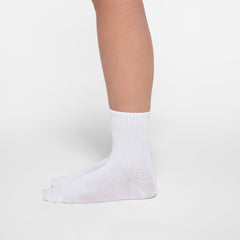 SPORT CREW SOCK 3-PACK | CORE MULTI ON A MODEL SIDE VIEW