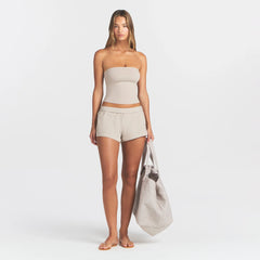 COTTON JERSEY LOOSE SHORT | STONE ON A MODEL FRONT VIEW @ | FOCUS: 0.0, 1.0, 0.9