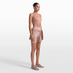 NikeSKIMS RIBBED SEAMLESS 5" BIKER SHORT | HIMALAYAN/ECRU ON A MODEL FRONT VIEW @ | FOCUS: 0.0, 1.0, 0.9