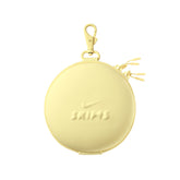 NikeSKIMS ACCESSORIES HARDSHELL ROUND CASE | BICYCLE YELLOW & LAYS FLAT ON A WHITE BACKGROUND | FLT