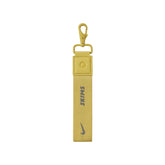 NikeSKIMS ACCESSORIES KEYCHAIN WRISTLET | CITRINE & LAYS FLAT ON A WHITE BACKGROUND | FLT