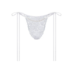 SKIMS LACE TIE SIDE TANGA | SNOW FLAT ON A WHITE BACKGROUND | FLT
