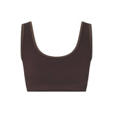 NikeSKIMS RIBBED SEAMLESS SCOOP BRA | PHOENIX/TRUFFLE FLAT ON A WHITE BACKGROUND | FLT