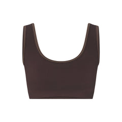 NikeSKIMS RIBBED SEAMLESS SCOOP BRA | PHOENIX/TRUFFLE FLAT ON A WHITE BACKGROUND | FLT