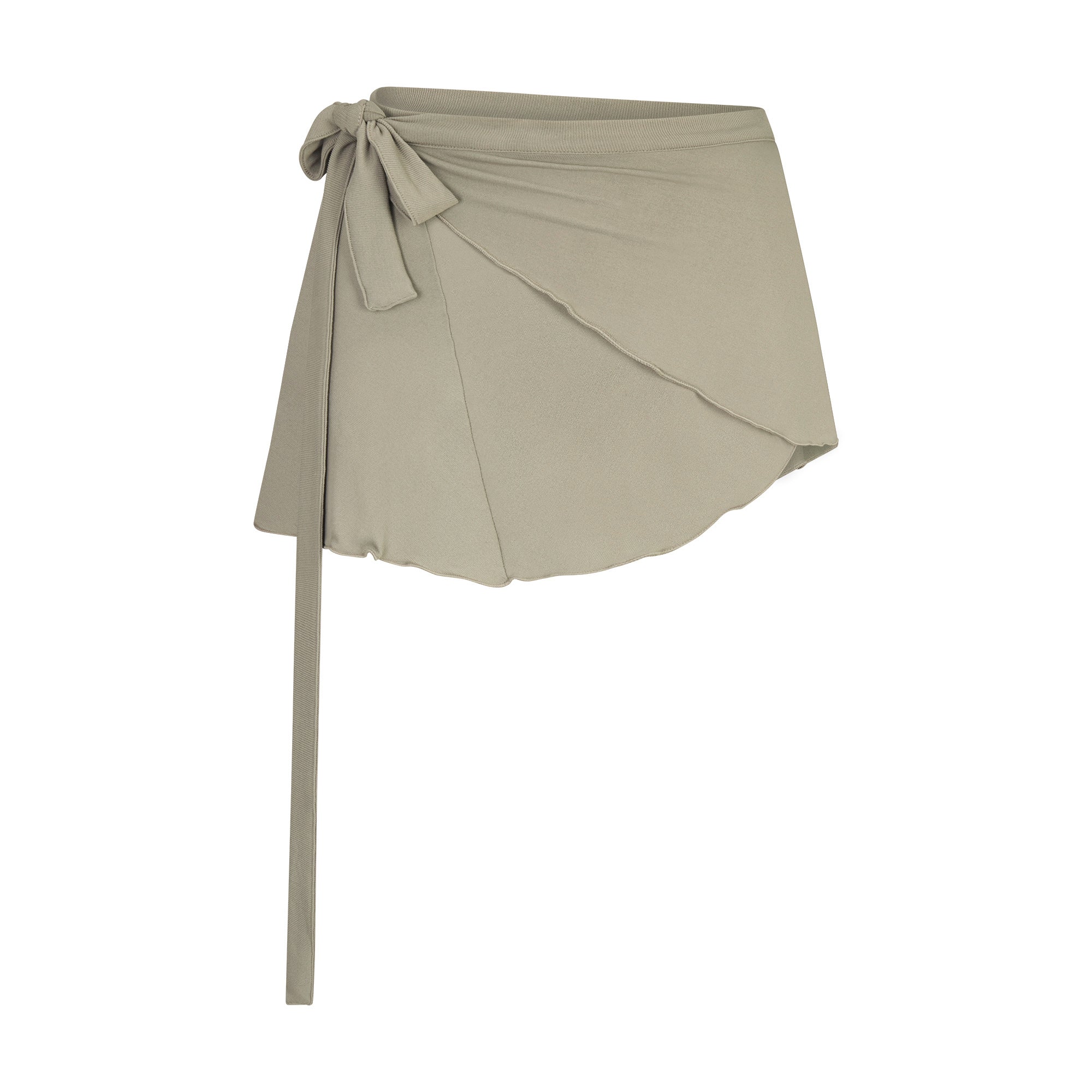 NikeSKIMS STRETCH KNIT WRAP SKIRT | DUNE FLAT ON A WHITE BACKGROUND | FLT