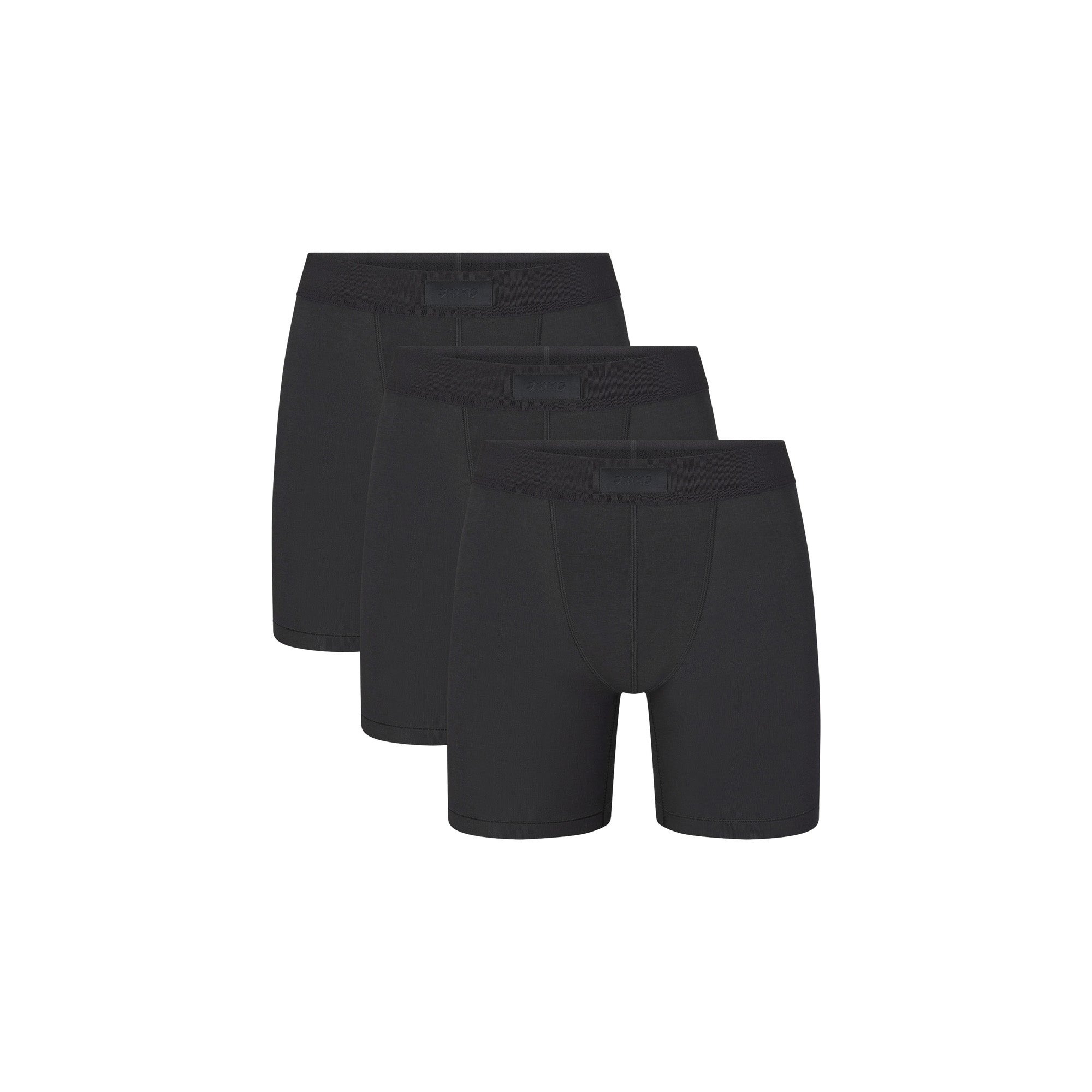 SKIMS COTTON MENS 5" BOXER BRIEF 3-PACK | ONYX (MENS BOXERS, MENS UNDERWEAR) LAYS FLAT ON A WHITE BACKGROUND | FLT | FOCUS: 0.0, 1.0, 0.9