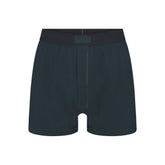 SKIMS COTTON MENS KNIT BOXER | VERDANT FLAT ON A WHITE BACKGROUND | FLT