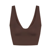 NikeSKIMS MATTE V-NECK BRA TOP | DARK SEPIA FLAT ON A WHITE BACKGROUND | FLT