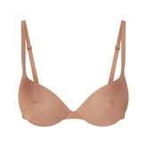 SKIMS ULTIMATE BRA NIPPLE PUSH-UP BRA | SIENNA (PLUNGE BRAS) LAYS FLAT ON A WHITE BACKGROUND | FLT