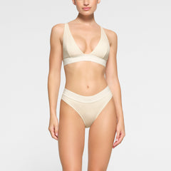 COTTON PLUNGE BRALETTE WORN BY A MODEL IN FRONT VIEW