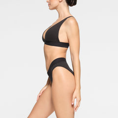 COTTON PLUNGE BRALETTE WORN BY A MODEL IN SIDE VIEW