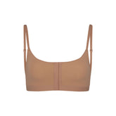 ADAPTIVE FITS EVERYBODY SCOOP BRALETTE | SIENNA (ADAPTIVE BRALETTES) LAYS FLAT ON A WHITE BACKGROUND | FLT