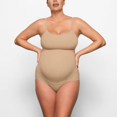 FITS EVERYBODY MATERNITY NURSING SCOOP BRALETTE WORN BY A MODEL IN FRONT VIEW, XL