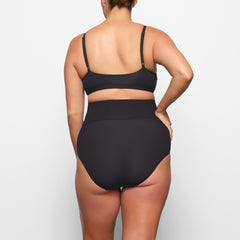 FITS EVERYBODY MATERNITY NURSING SCOOP BRALETTE WORN BY A MODEL IN BACK VIEW