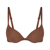 SKIMS ULTIMATE BRA TEARDROP PUSH-UP BRA | JASPER (PLUNGE BRAS) LAYS FLAT ON A WHITE BACKGROUND | FLT
