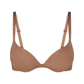 SKIMS ULTIMATE BRA TEARDROP PUSH-UP BRA | SIENNA (PLUNGE BRAS) LAYS FLAT ON A WHITE BACKGROUND | FLT