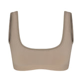 NikeSKIMS RIBBED SEAMLESS MICRO SCOOP BRA | DRIFTWOOD & LAYS FLAT ON A WHITE BACKGROUND | FLT