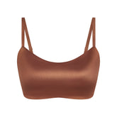 NikeSKIMS SATIN SHINE SCOOP CAMI BRA | CAROB BROWN & LAYS FLAT ON A WHITE BACKGROUND | FLT
