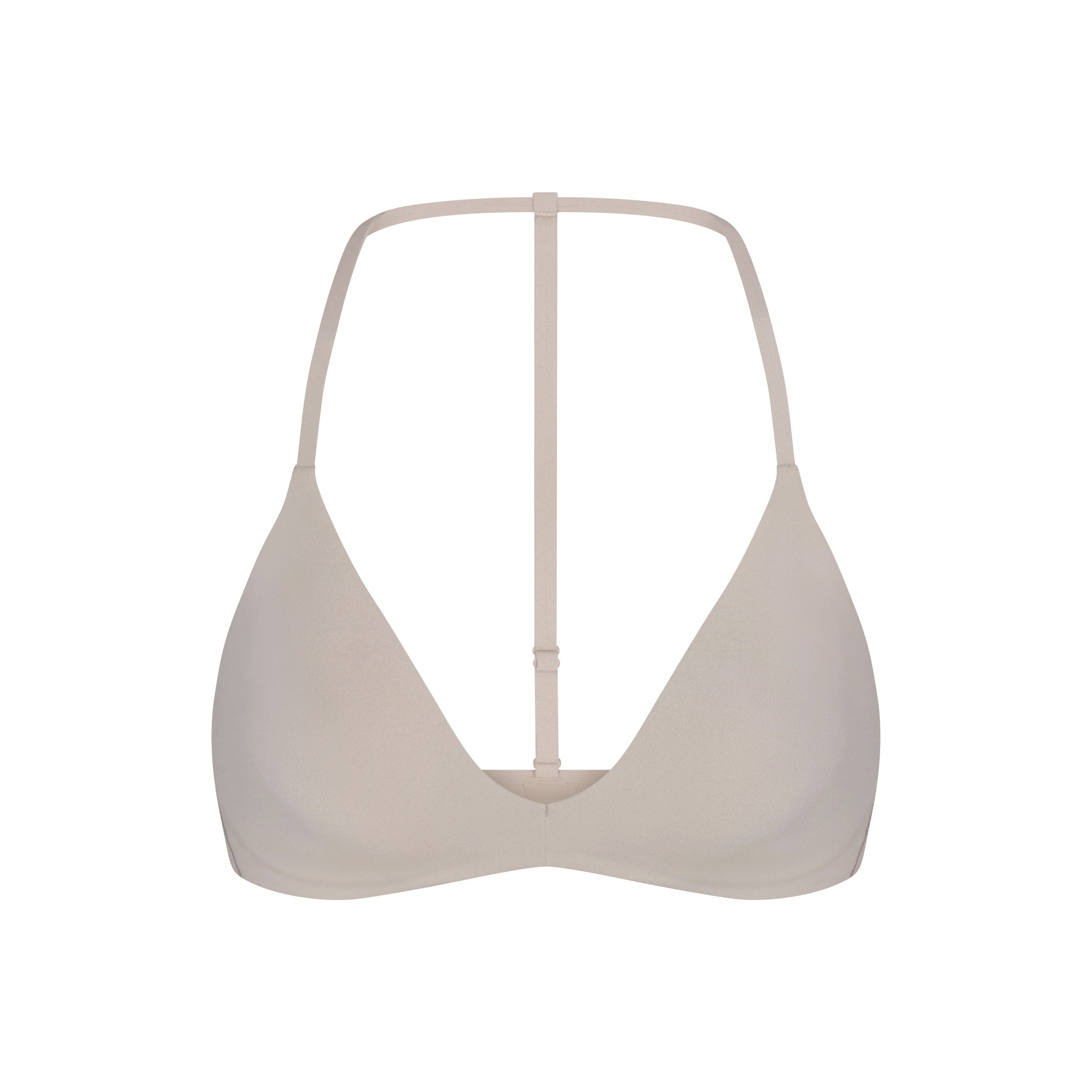 NikeSKIMS STUDIO STRETCH T-BACK TRIANGLE BRA | LINEN LAYS FLAT ON A WHITE BACKGROUND | FLT