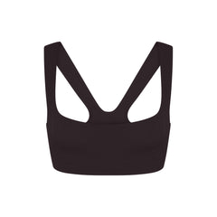 NikeSKIMS STUDIO STRETCH RACER BACK BRA | DARK ROAST LAYS FLAT ON A WHITE BACKGROUND | FLT