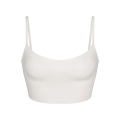 NikeSKIMS MATTE CAMI BRA TOP | IVORY LAYS FLAT ON A WHITE BACKGROUND | FLT