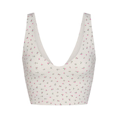 NikeSKIMS MATTE V-NECK BRA TOP | DITSY FLORAL PRINT LAYS FLAT ON A WHITE BACKGROUND | FLT