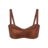 NikeSKIMS SATIN SHINE PANELED PICOT BRA | CAROB BROWN & LAYS FLAT ON A WHITE BACKGROUND | FLT
