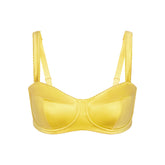 NikeSKIMS SATIN SHINE PANELED PICOT BRA | CITRINE & LAYS FLAT ON A WHITE BACKGROUND | FLT