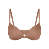 SKIMS ULTIMATE NIPPLE WIRELESS PUSH-UP BRA | SIENNA FLAT ON A WHITE BACKGROUND | FLT