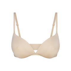 SKIMS ULTIMATE NIPPLE WIRELESS PUSH-UP BRA | SAND FLAT ON A WHITE BACKGROUND | FLT