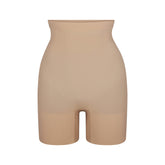 EVERYDAY SCULPT HIGH-WAISTED MID THIGH SHORT | CLAY (SHAPEWEAR SHORTS, SHAPEWEAR) LAYS FLAT ON A WHITE BACKGROUND | FLT
