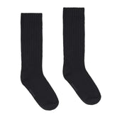SLOUCH SOCK | SOOT (SLOUCH SOCKS) LAYS FLAT ON A WHITE BACKGROUND | FLT