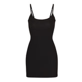 SOFT LOUNGE SLIP DRESS | ONYX LAYS FLAT ON A WHITE BACKGROUND | FLT