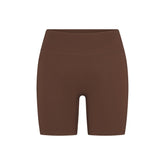 NikeSKIMS MATTE 5" BIKER SHORT | DARK SEPIA FLAT ON A WHITE BACKGROUND | FLT