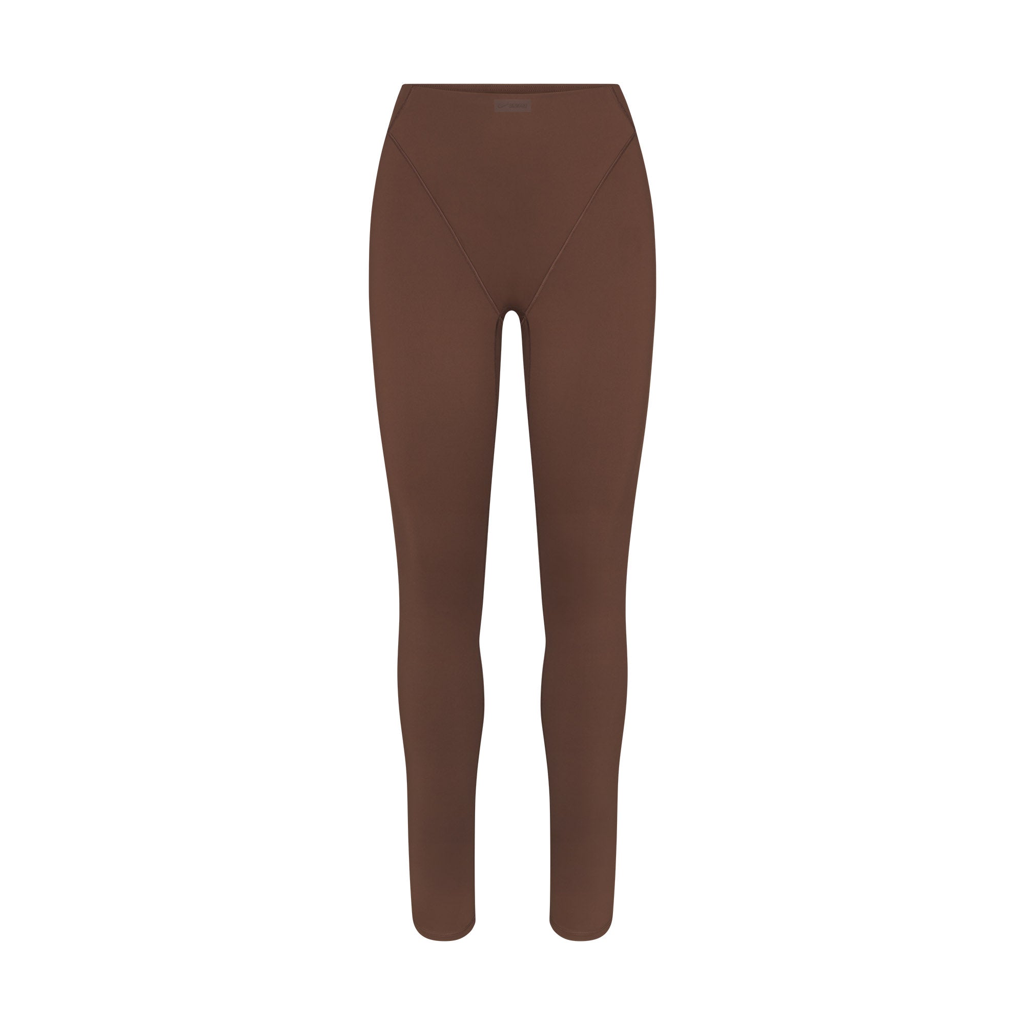 NikeSKIMS MATTE V-LINE 26" LEGGING | DARK SEPIA FLAT ON A WHITE BACKGROUND | FLT