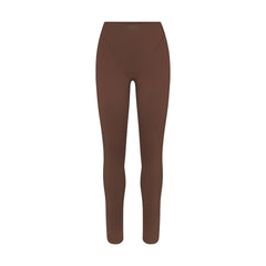 NikeSKIMS MATTE V-LINE 26" LEGGING | DARK SEPIA FLAT ON A WHITE BACKGROUND | FLT