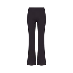 NikeSKIMS MATTE SLIM FLARE LEGGING | OBSIDIAN FLAT ON A WHITE BACKGROUND | FLT