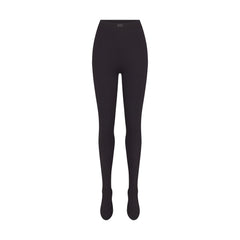 NikeSKIMS MATTE FOOTSIE GRIP LEGGING | OBSIDIAN FLAT ON A WHITE BACKGROUND | FLT