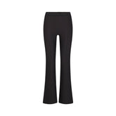 SKIMS BODY HIGH-WAISTED FLARE PANT | ONYX FLAT ON A WHITE BACKGROUND | FLT