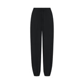 SKIMS SLEEP JOGGER | ONYX FLAT ON A WHITE BACKGROUND | FLT