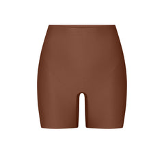 SKIMS BODY CORE SCULPT SHORTIE | JASPER FLAT ON A WHITE BACKGROUND | FLT