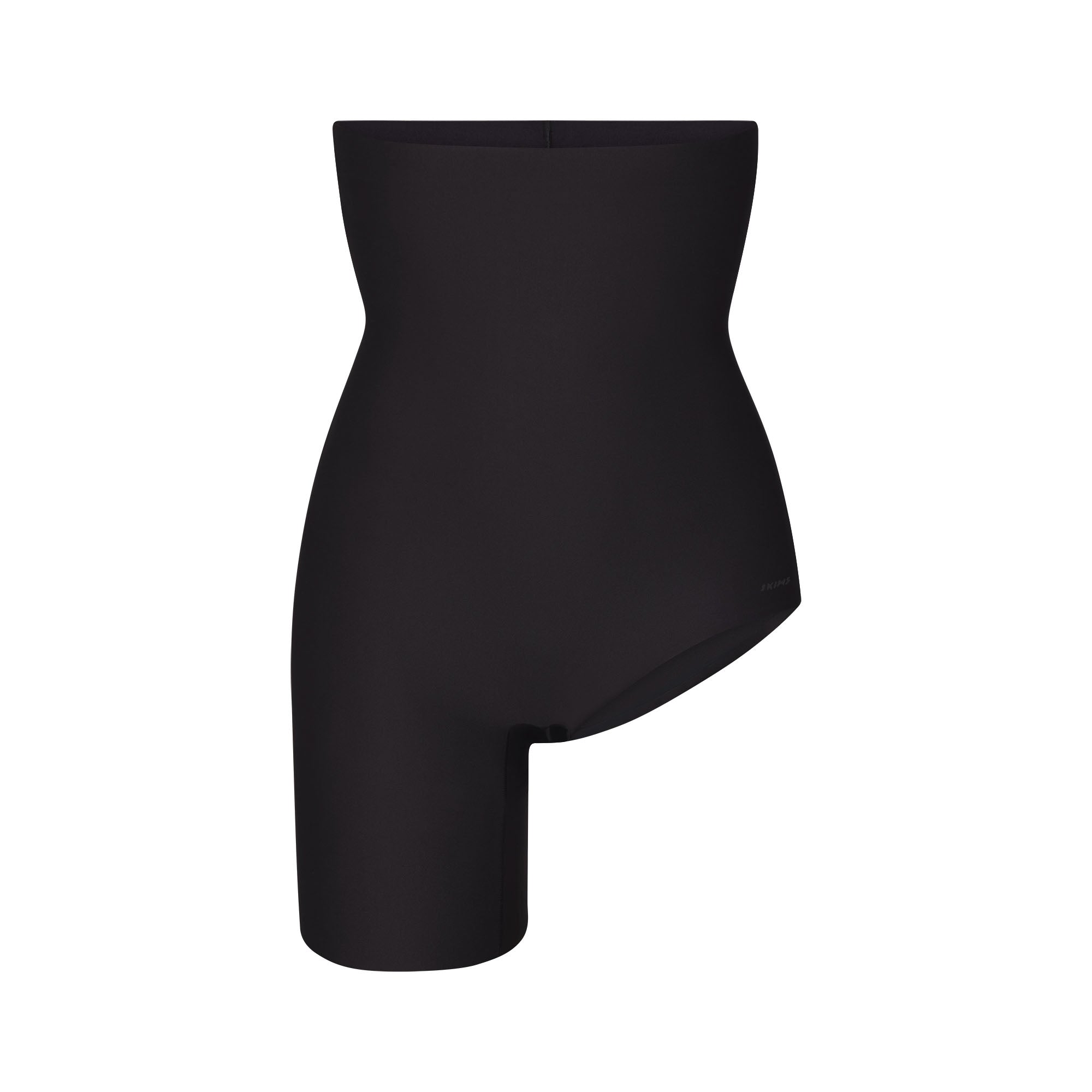 SKIMS BODY LEFT LEG SOLUTION SHORT | ONYX FLAT ON A WHITE BACKGROUND | FLT