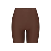SKIMS BODY BUTT ENHANCING PADDED SHORT | COCOA FLAT ON A WHITE BACKGROUND | FLT | FLT