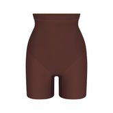 SKIMS BODY CORE SCULPT MID RISE SHORT | COCOA FLAT ON A WHITE BACKGROUND | FLT | FLT