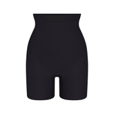 SKIMS BODY CORE SCULPT MID RISE SHORT | ONYX FLAT ON A WHITE BACKGROUND | FLT | FLT