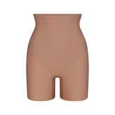 SKIMS BODY CORE SCULPT MID RISE SHORT | SIENNA FLAT ON A WHITE BACKGROUND | FLT | FLT