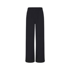 NikeSKIMS WOVEN NYLON OVERSIZED TRACK PANT | OBSIDIAN FLAT ON A WHITE BACKGROUND | FLT
