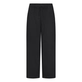 WOVEN COTTON OVERSIZED STRAIGHT LEG PANT | ONYX FLAT ON A WHITE BACKGROUND | FLT