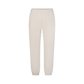 DRAPEY FRENCH TERRY CROPPED JOGGER | BUFF FLAT ON A WHITE BACKGROUND | FLT